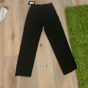 PrettyLittleThing black split hen jeans